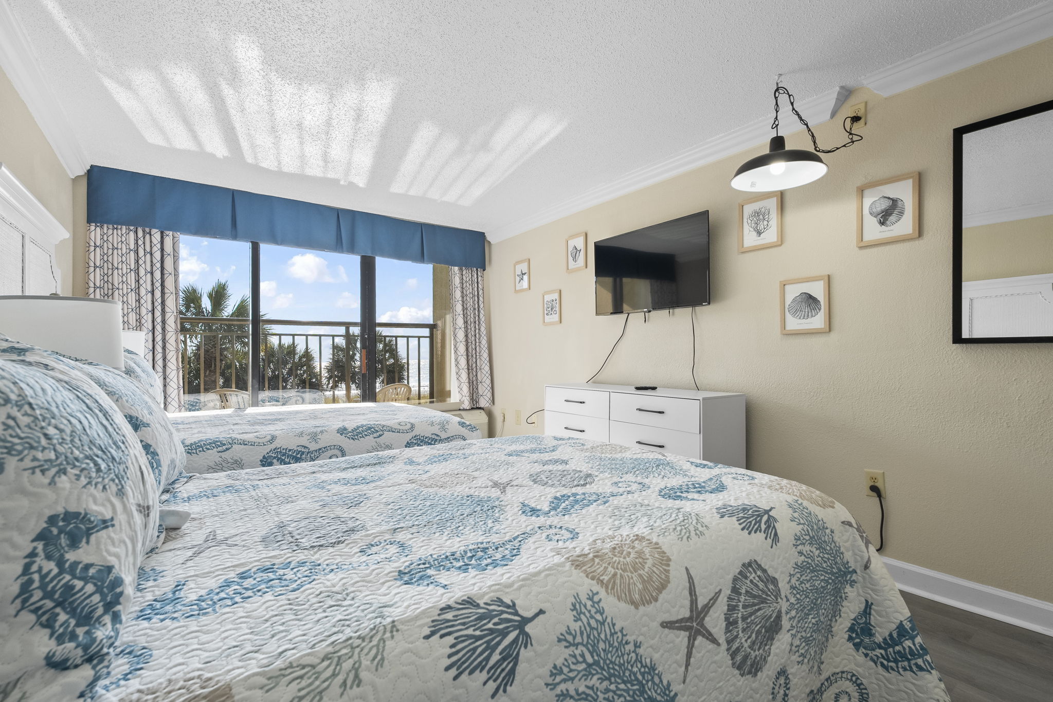 Main Bedroom with two queen beds and a direct oceanfront view