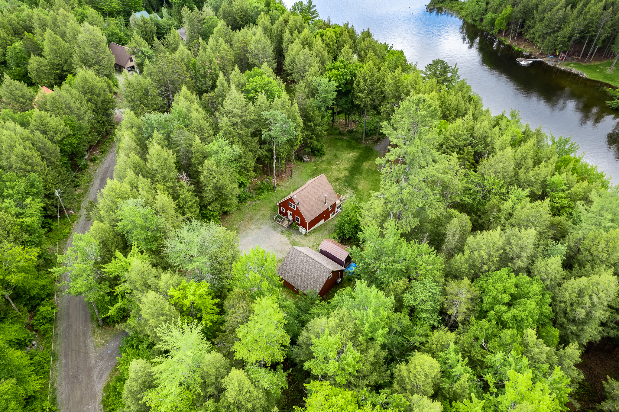 Aerial view of the house and large parking area for truck and trailers. Peaceful and quiet surroundings that are perfect to unplug and relax.