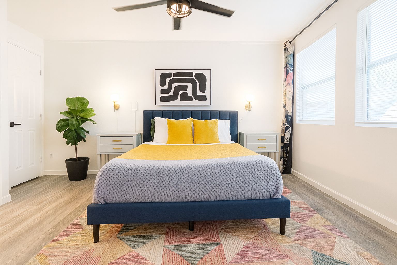 Master bedroom: Spacious retreat with comfy memory bed,natural light, real plants, black out curtain, ensuite full bath for restful nights