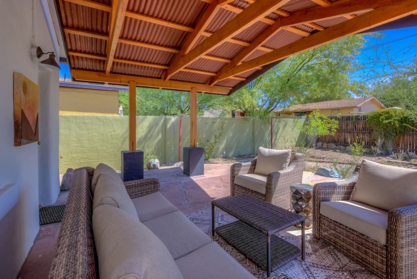 Nice back patio with flagstone and mature plantings