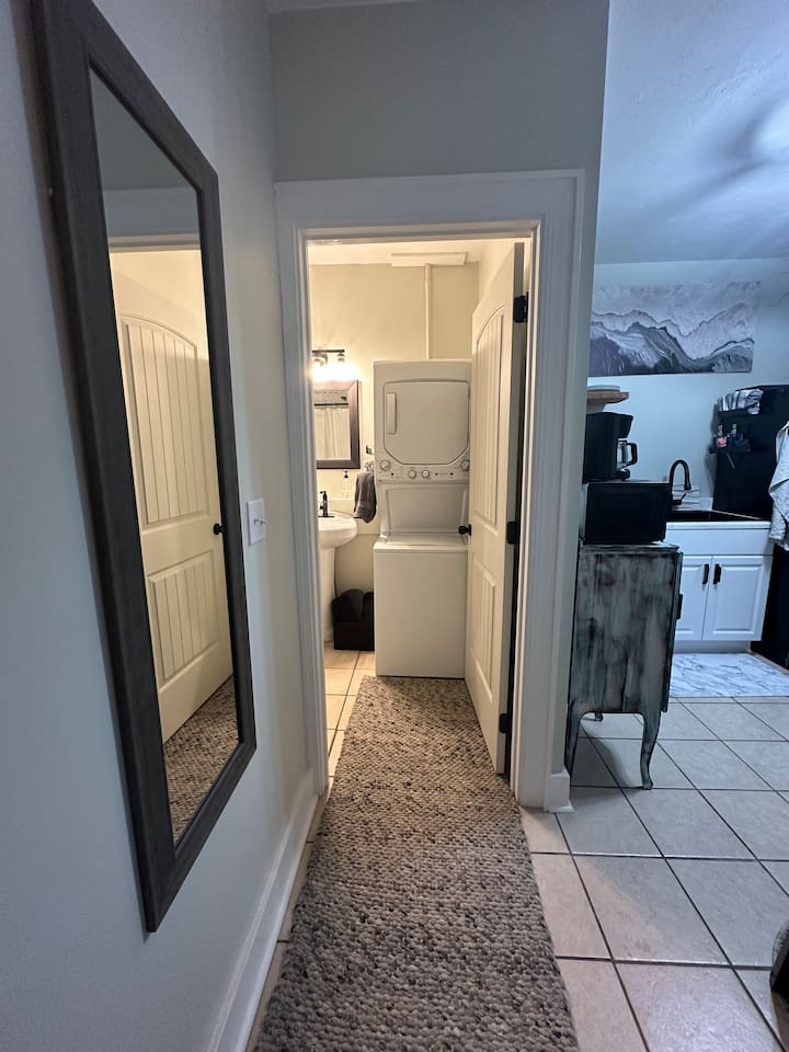 stackable washer and dryer in bathroom