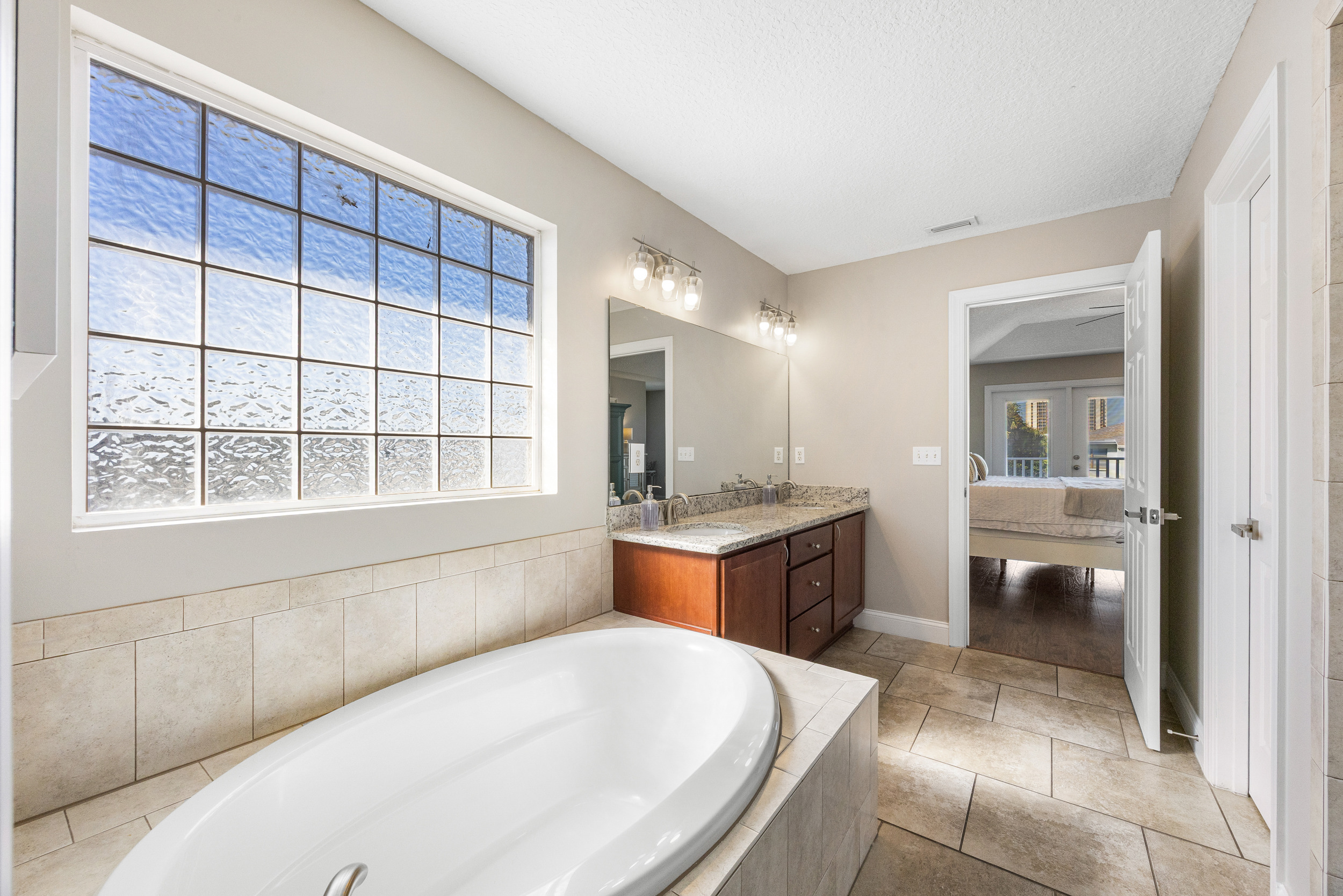 Soaking tub with natural light in master bath