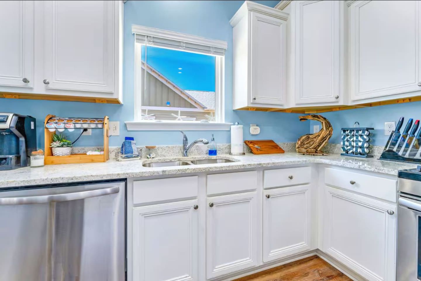 Bright & functional. Enjoy preparing meals in this beautiful kitchen featuring ample counter space and plenty of natural light