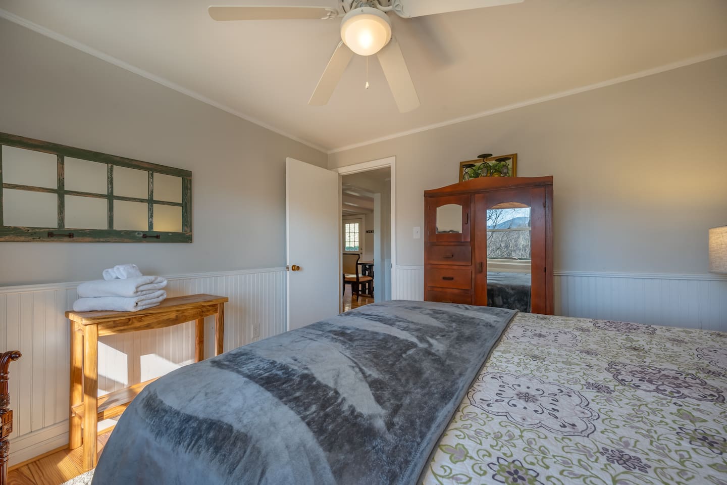 Primary bedroom with king bed and private full bathroom
Main level of cabin