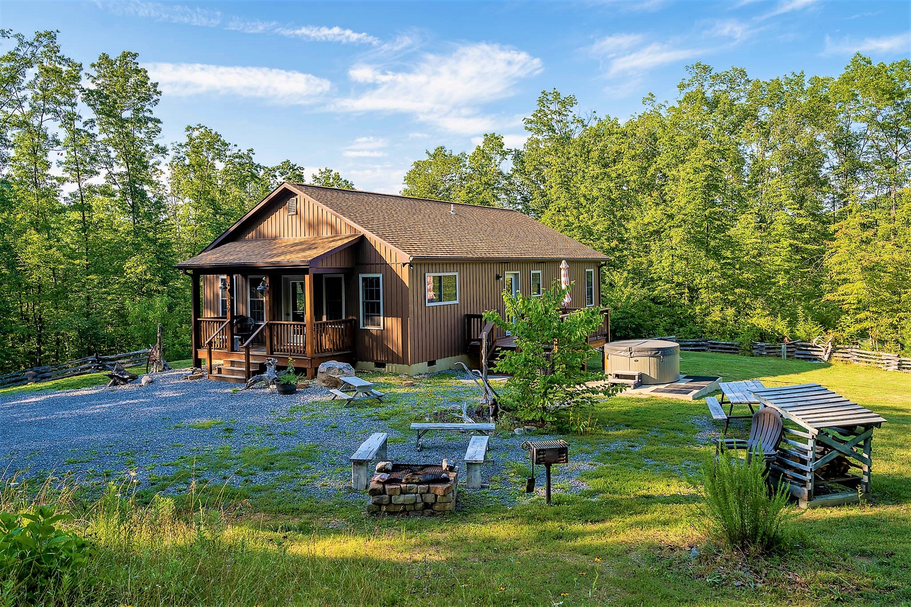 Relax on the deck and take in the quiet surroundings, where fresh mountain air and nature create the perfect escape.