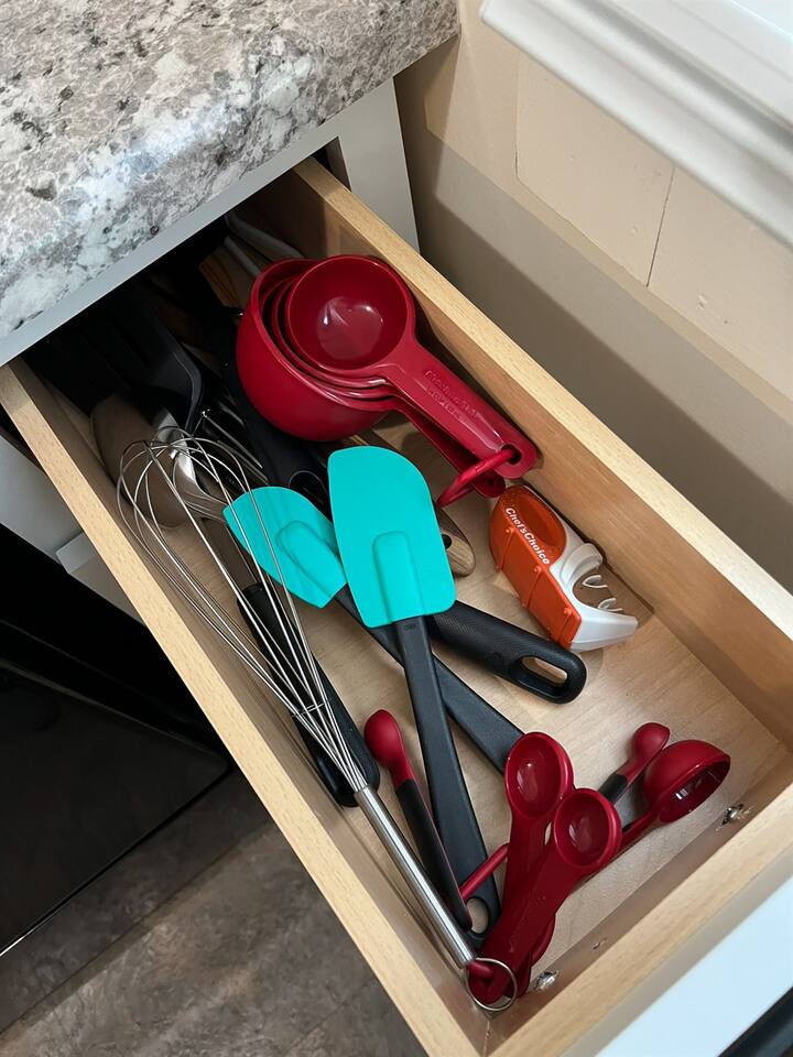Fully equipped kitchen featuring a range of cooking tools and essentials for meal preparation, and more—designed for convenience and functionality, making it the perfect space for cooking and culinary creativity