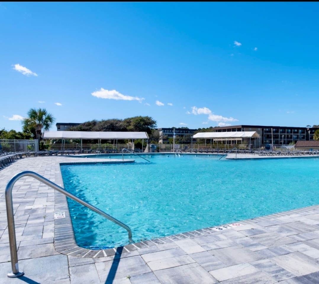 Pool with lounge chairs