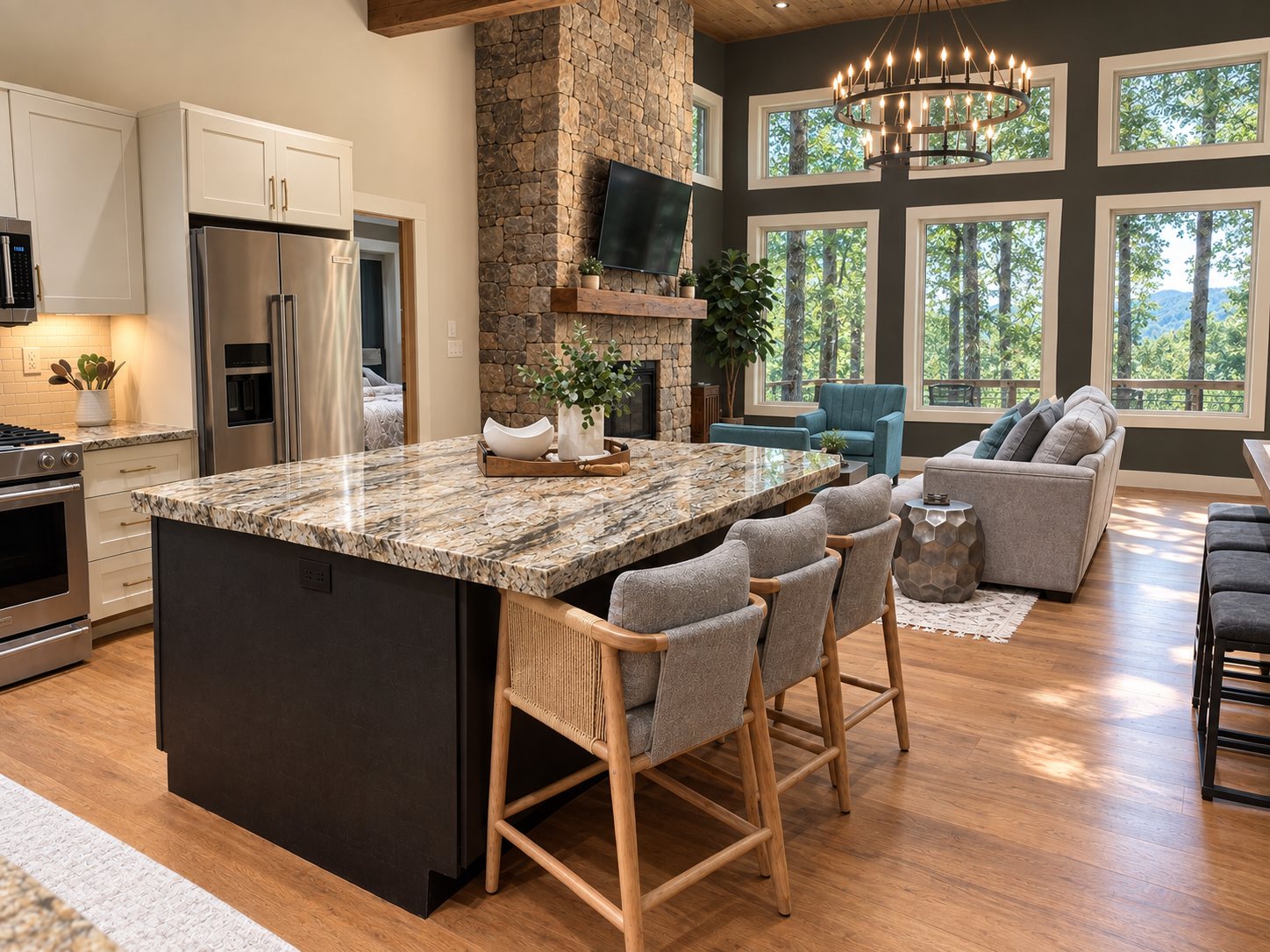 Main level open concept oversized kitchen island and living room