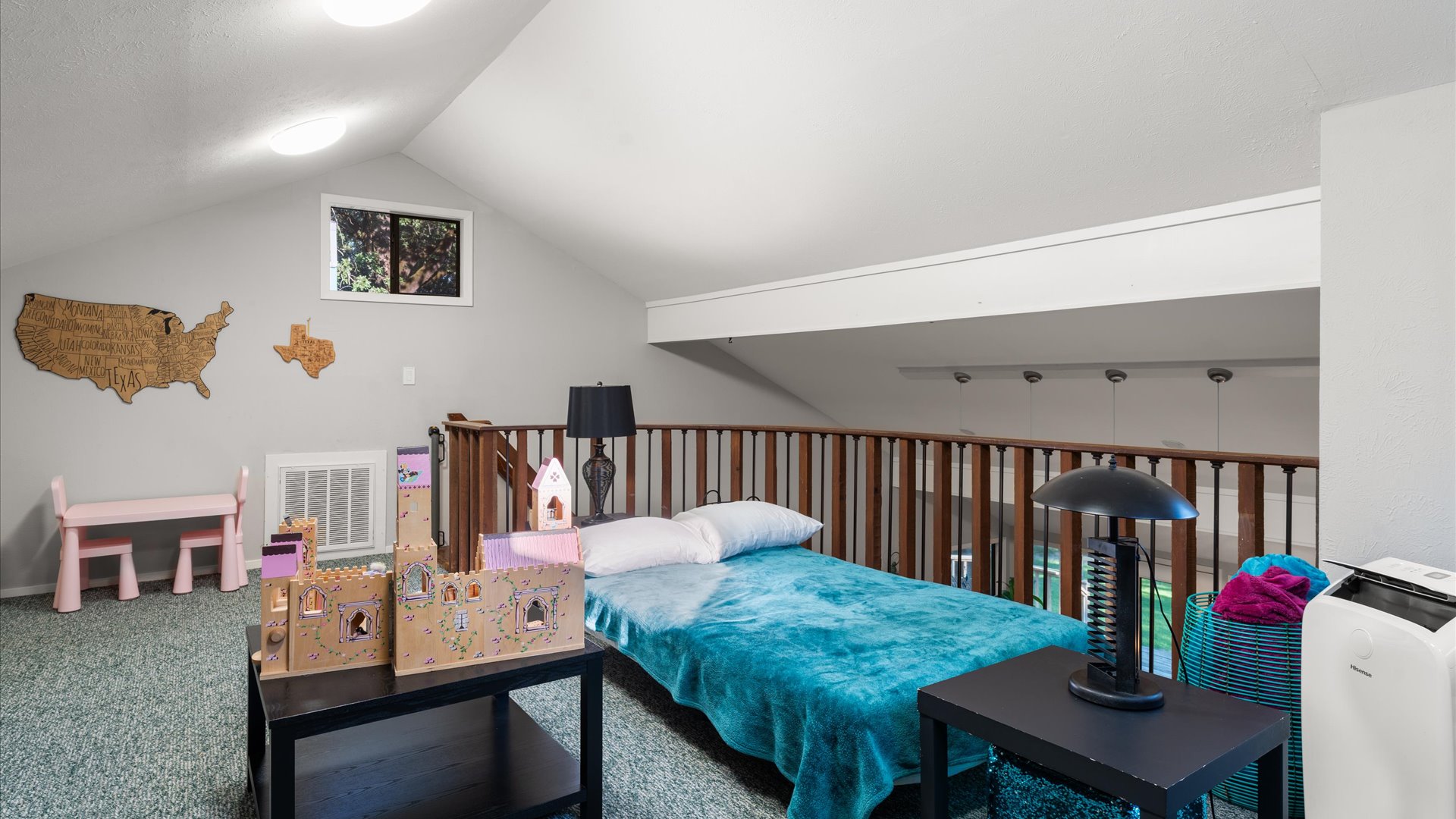 The couch in the children’s loft easily transforms into a bed, adding extra sleeping space for little ones. It’s a great spot for a movie night snooze or for kids who want their own fun.
