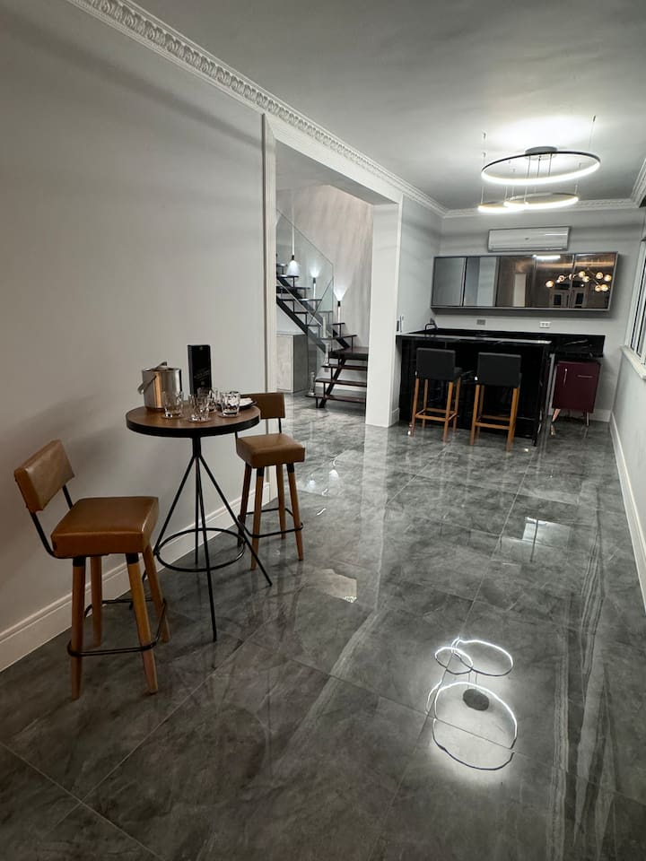 At night, the designer lighting dazzles the modern space. 