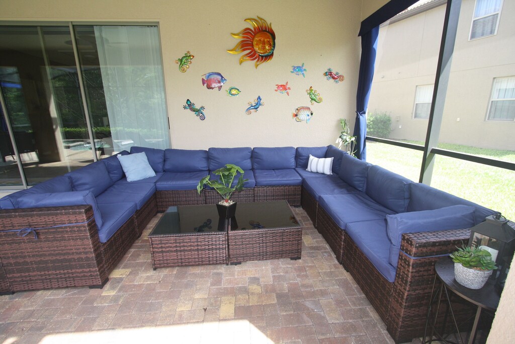 LOTS of seating with this comfy sectional patio set and table