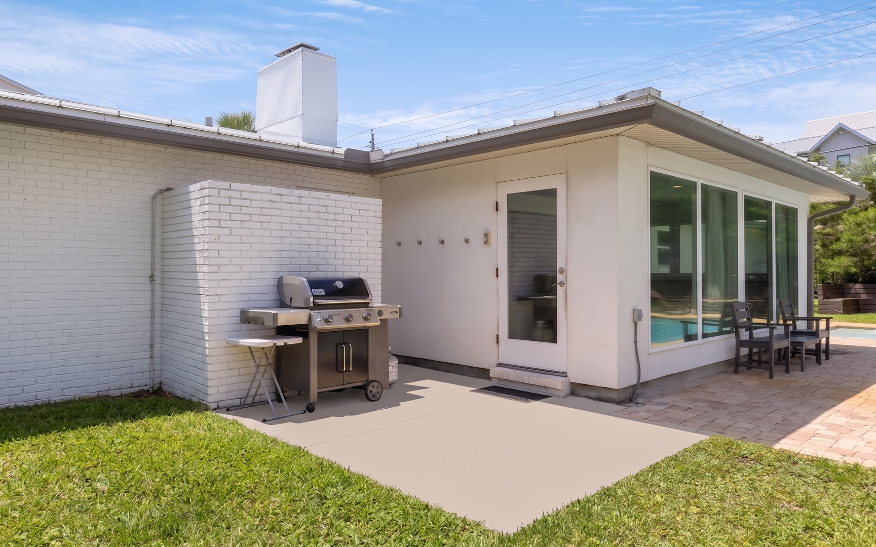 The propane grill makes backyard cookouts part of the experience, adding a flavorful touch to days spent outside.
