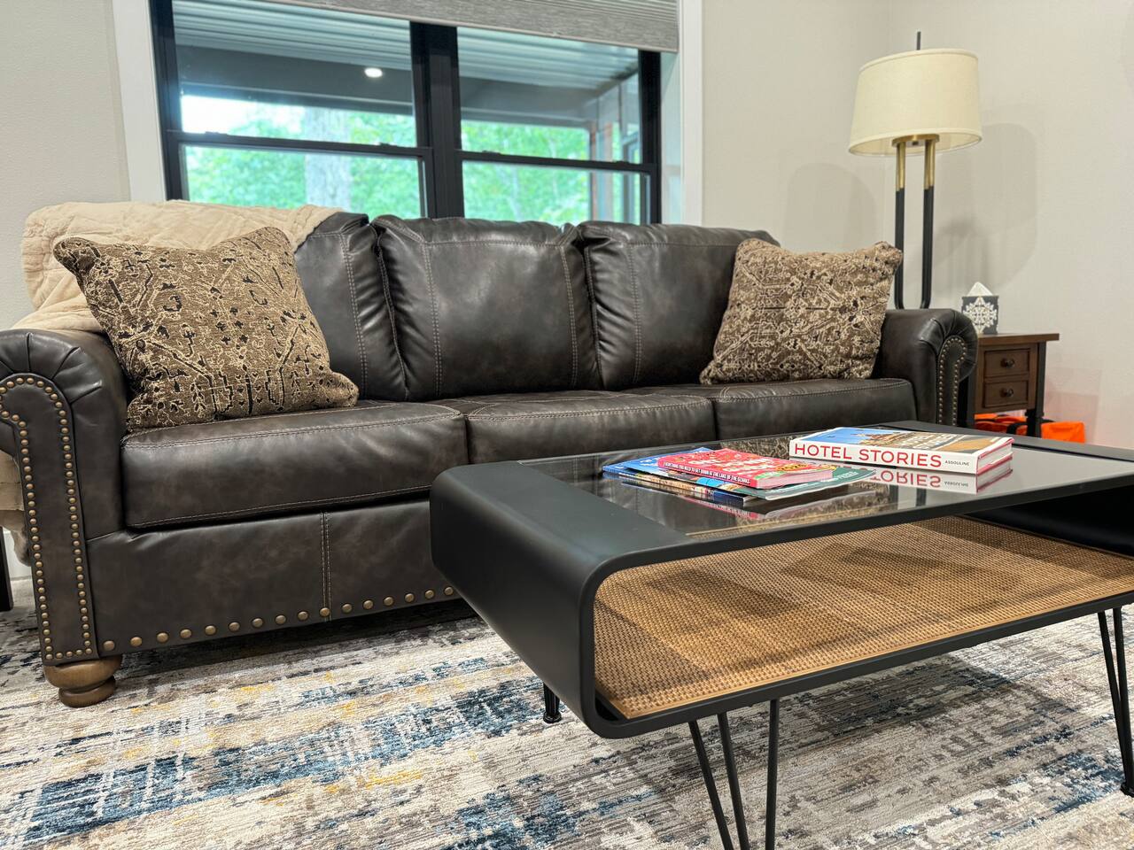 Enjoy modern furnishings with real leather furniture and a sleek contemporary style. 