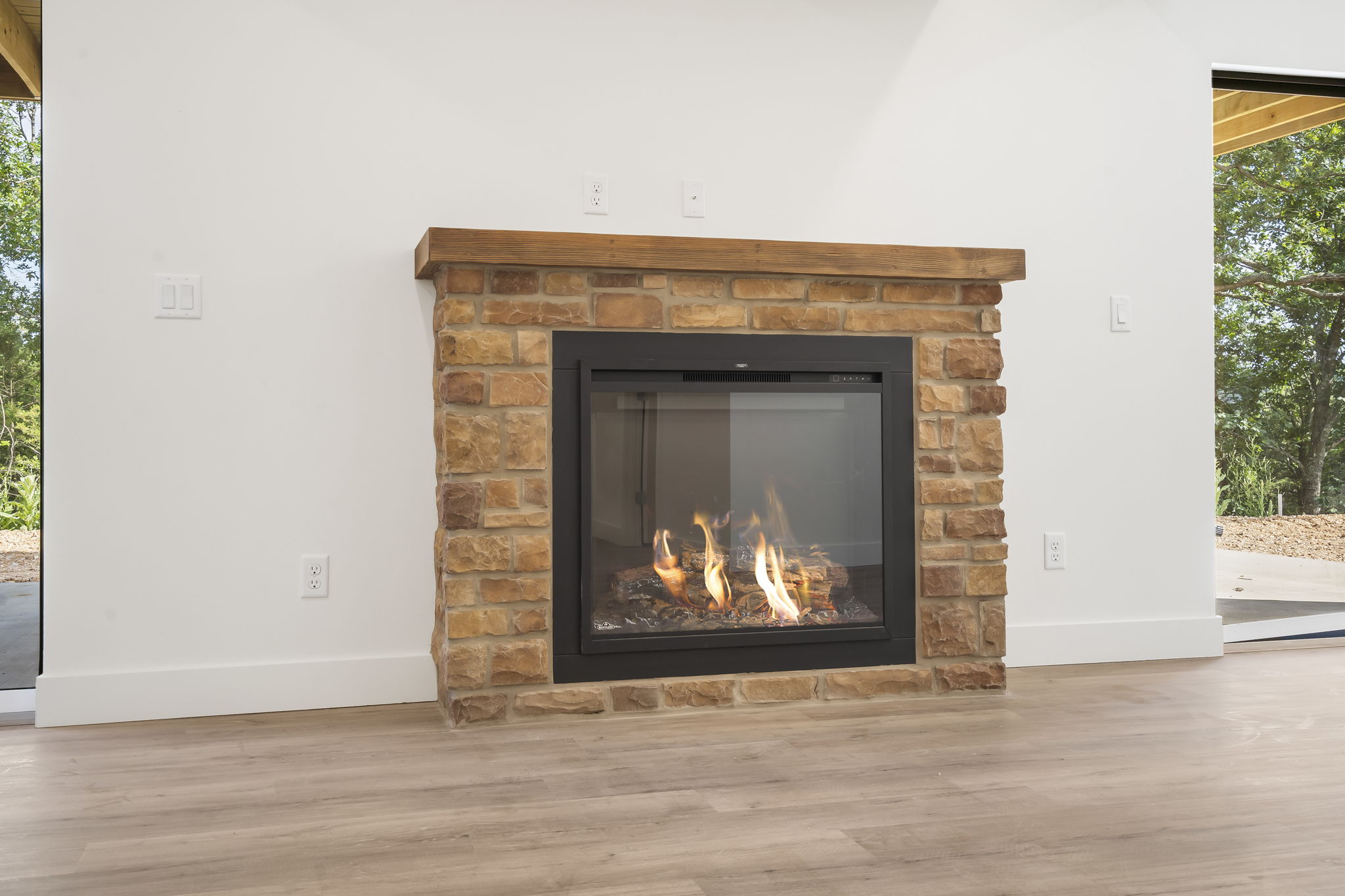 Spend time with your loved ones by the cozy fire in the lower level living room