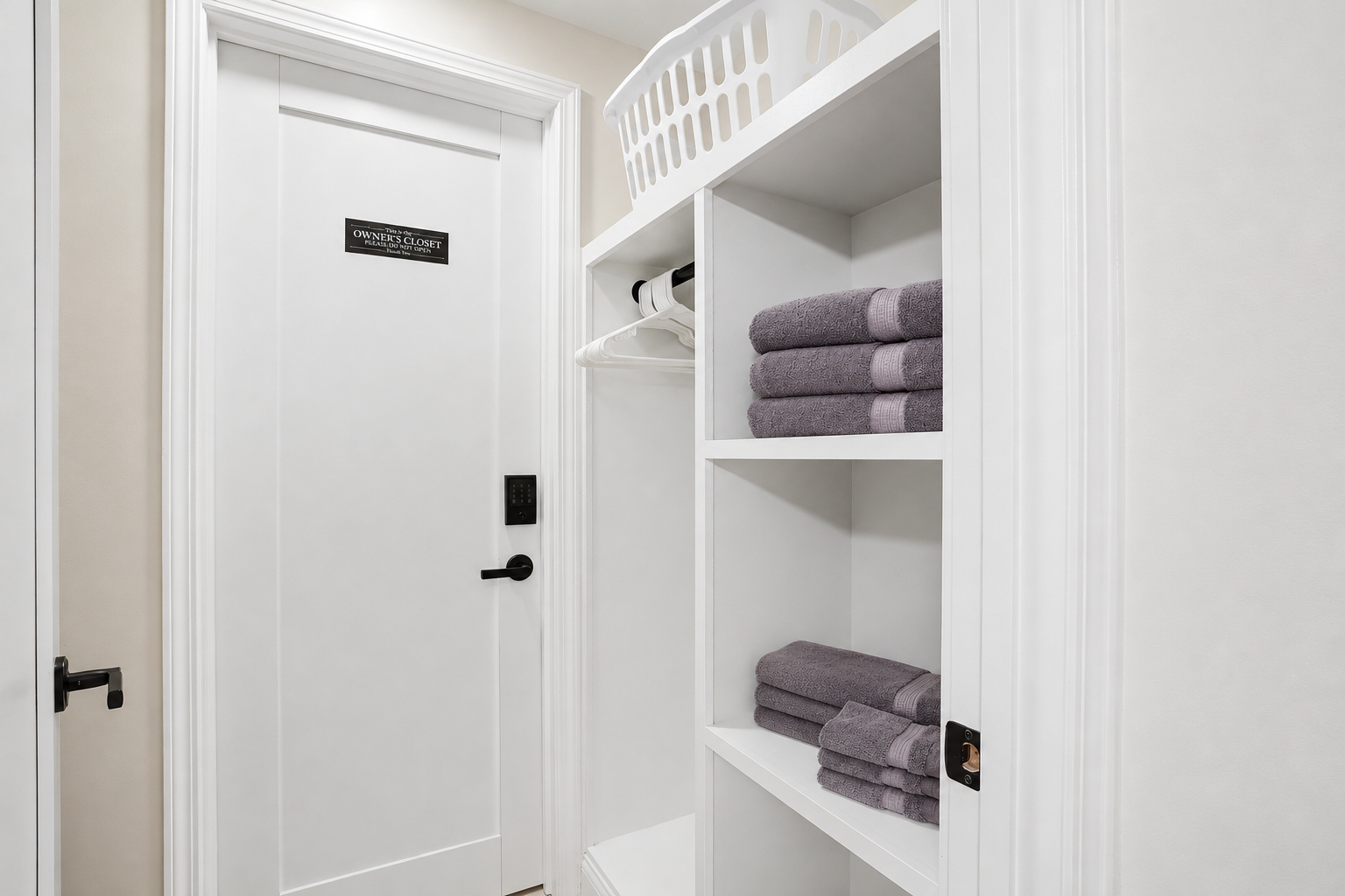 Clean, organized linen storage area designed for guest convenience. Built-in shelving provides neatly stacked towels and essentials, paired with a modern, minimal design for a fresh and hotel-like feel. Located conveniently near the bathroom, this dedicate