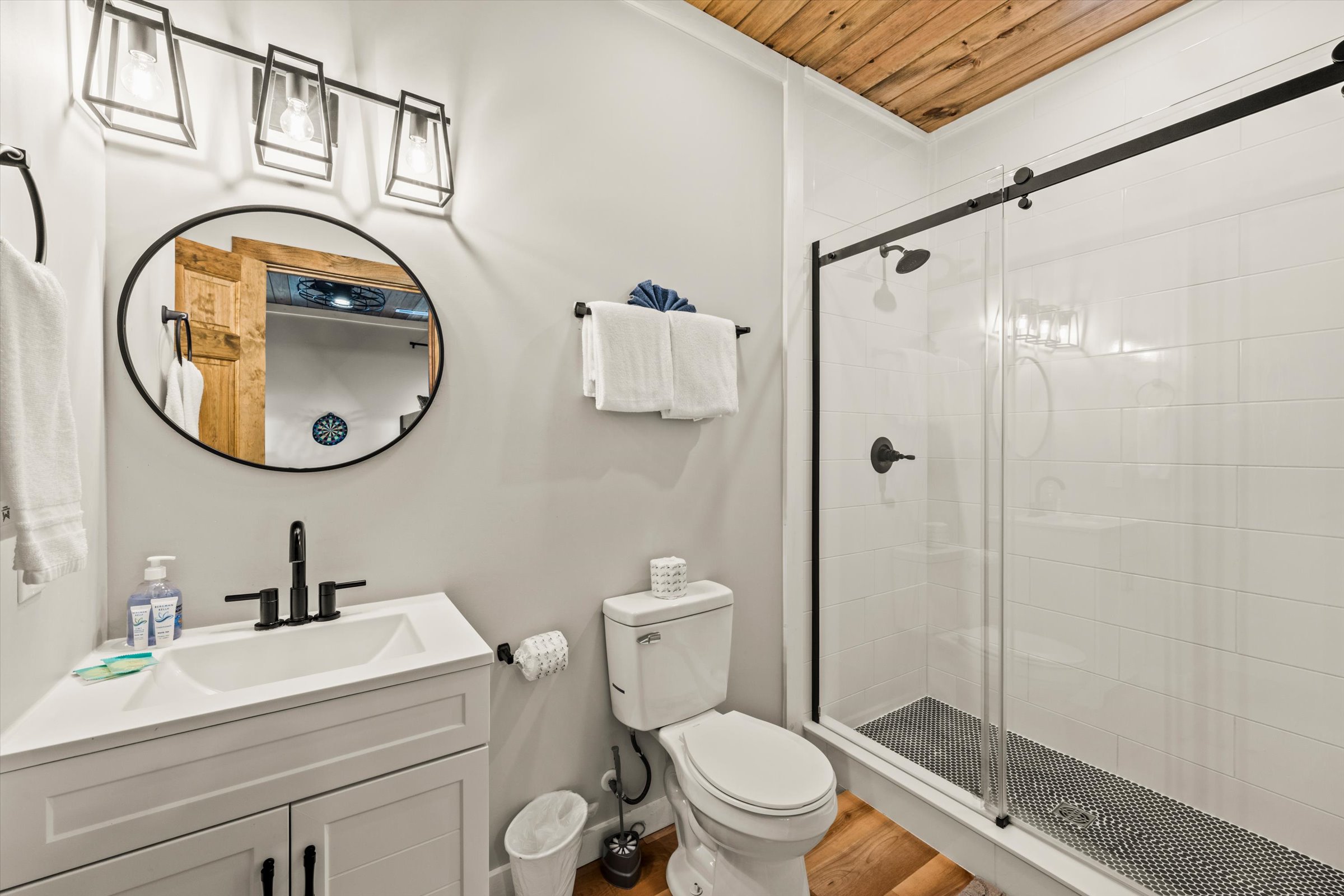 Fresh white towels and a starter set of toiletries provided in every bathroom.