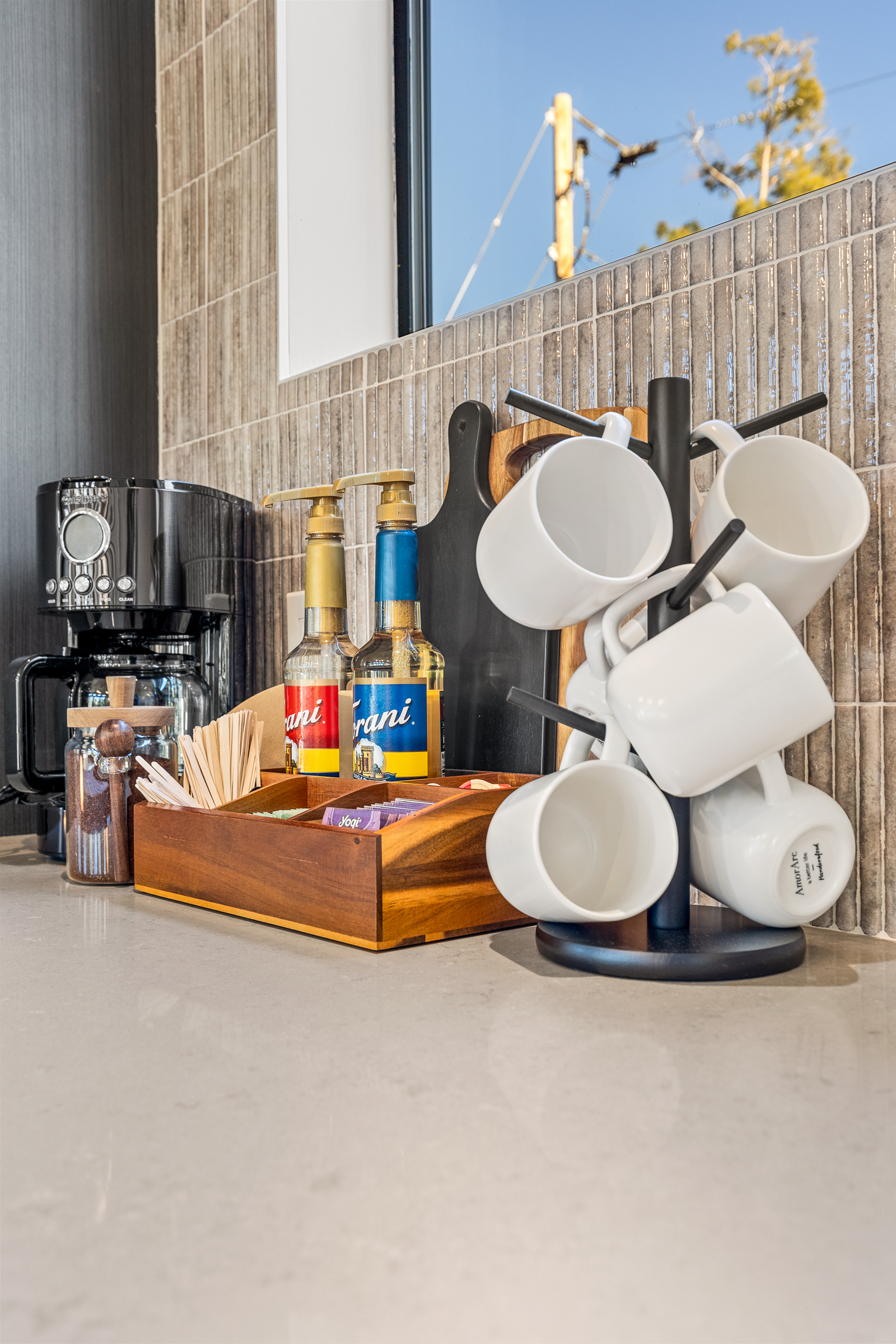 Begin your day with a well-appointed coffee and tea setup, designed for easy mornings and relaxed moments.