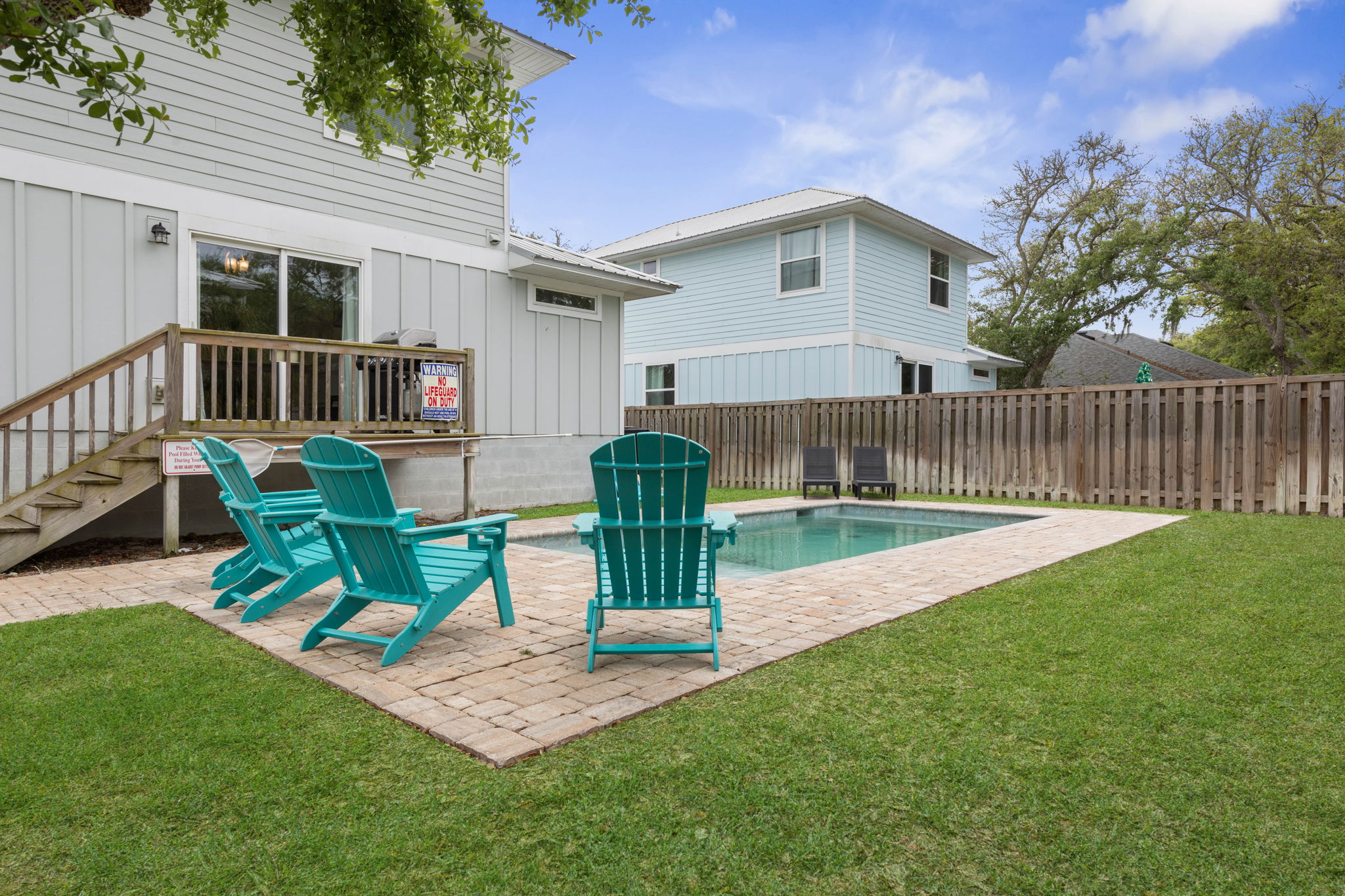 Private backyard and pool area create the perfect balance of fun and relaxation.