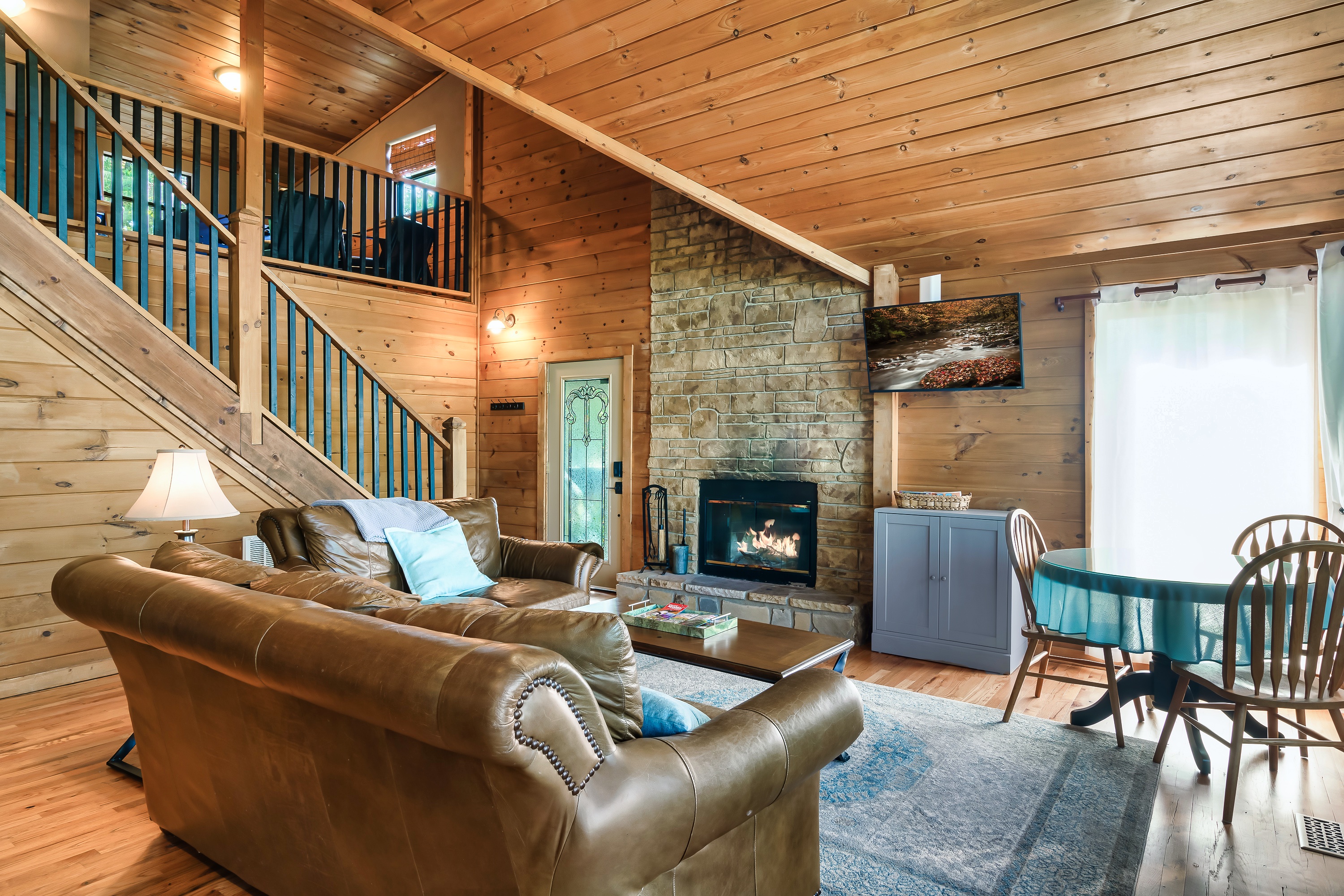Wood burning fireplace and flat screen TV