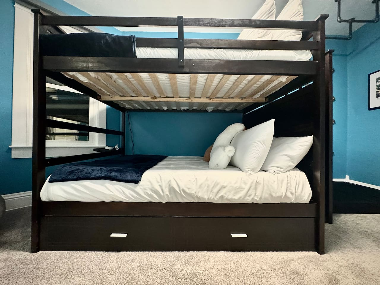 Full over full bunk beds with twin trundle.