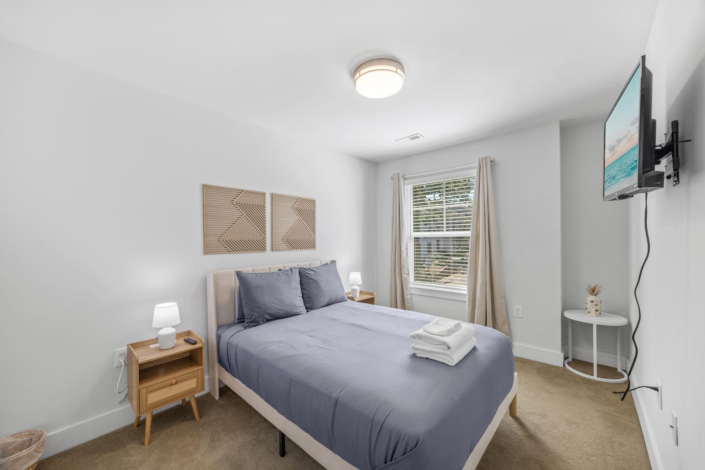Comfortable double bed with soft linens, bedside lighting, and calming décor for restful nights.