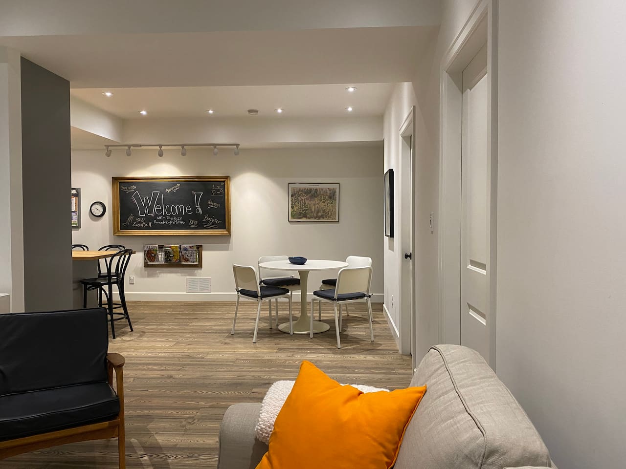 Looking from the living room into the  dinning and kitchen 
The suite has open concept floor plan.  
On the right hand you can see the doors that go to each of the bedrooms.