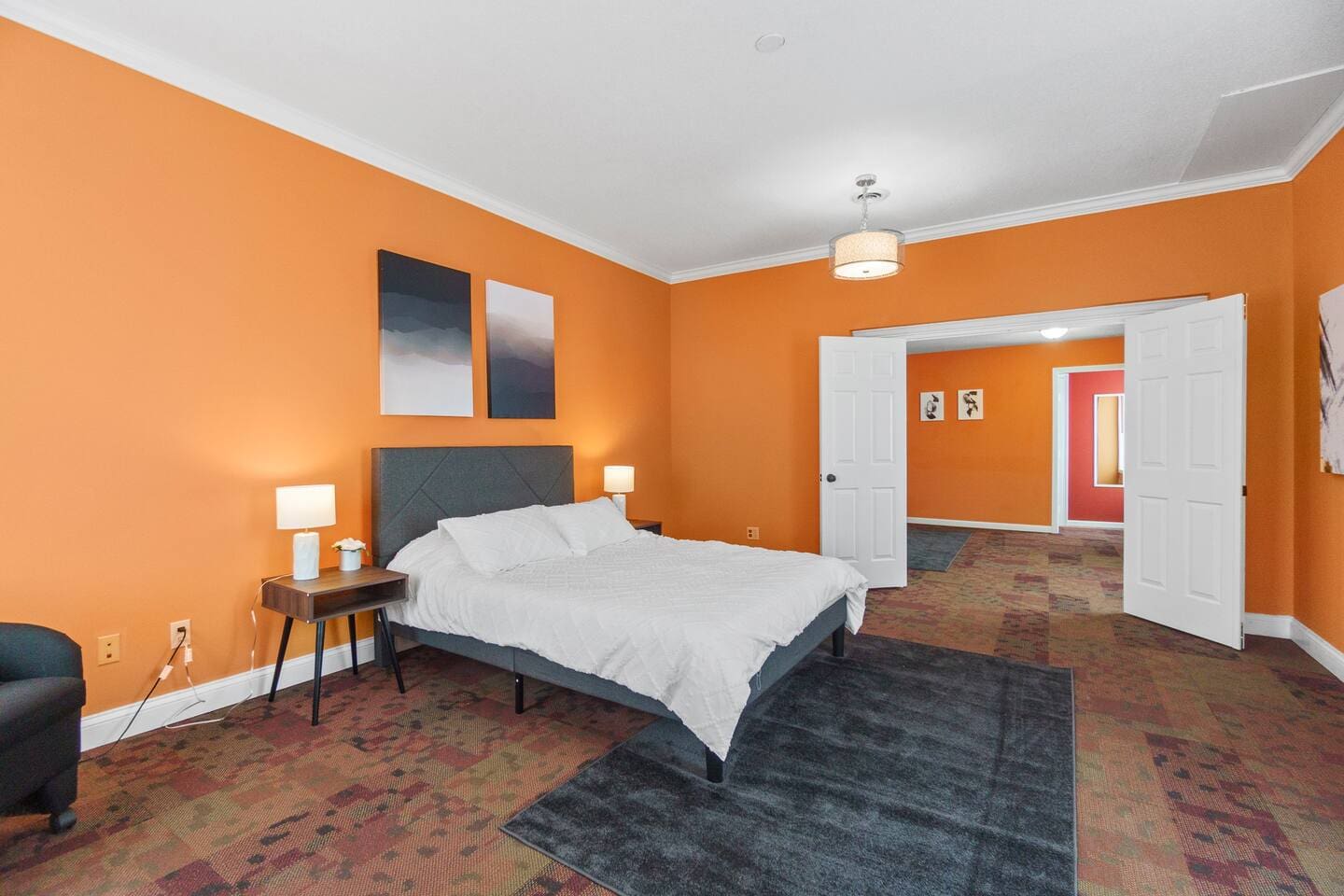 View of the bedroom showcasing its spacious layout, offering plenty of room for relaxation and comfort.