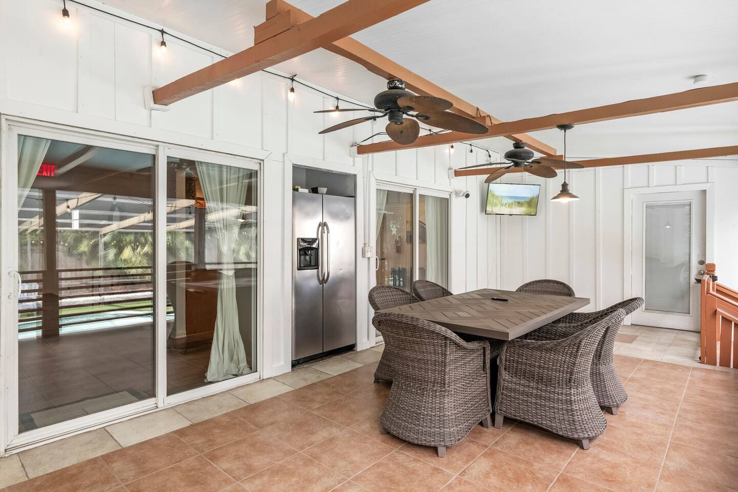 Massive patio with TV, latching gates overlooking saltwater pool 