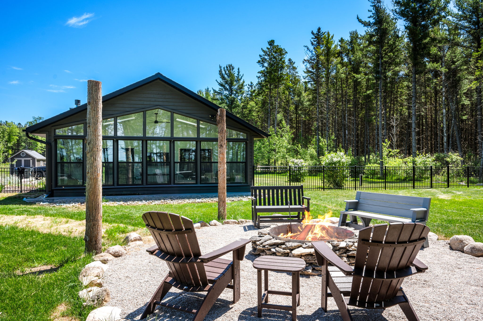Roast marshmallows and share stories around the stone fire pit, with Adirondack chairs and benches while enjoying the starry Door County night sky.