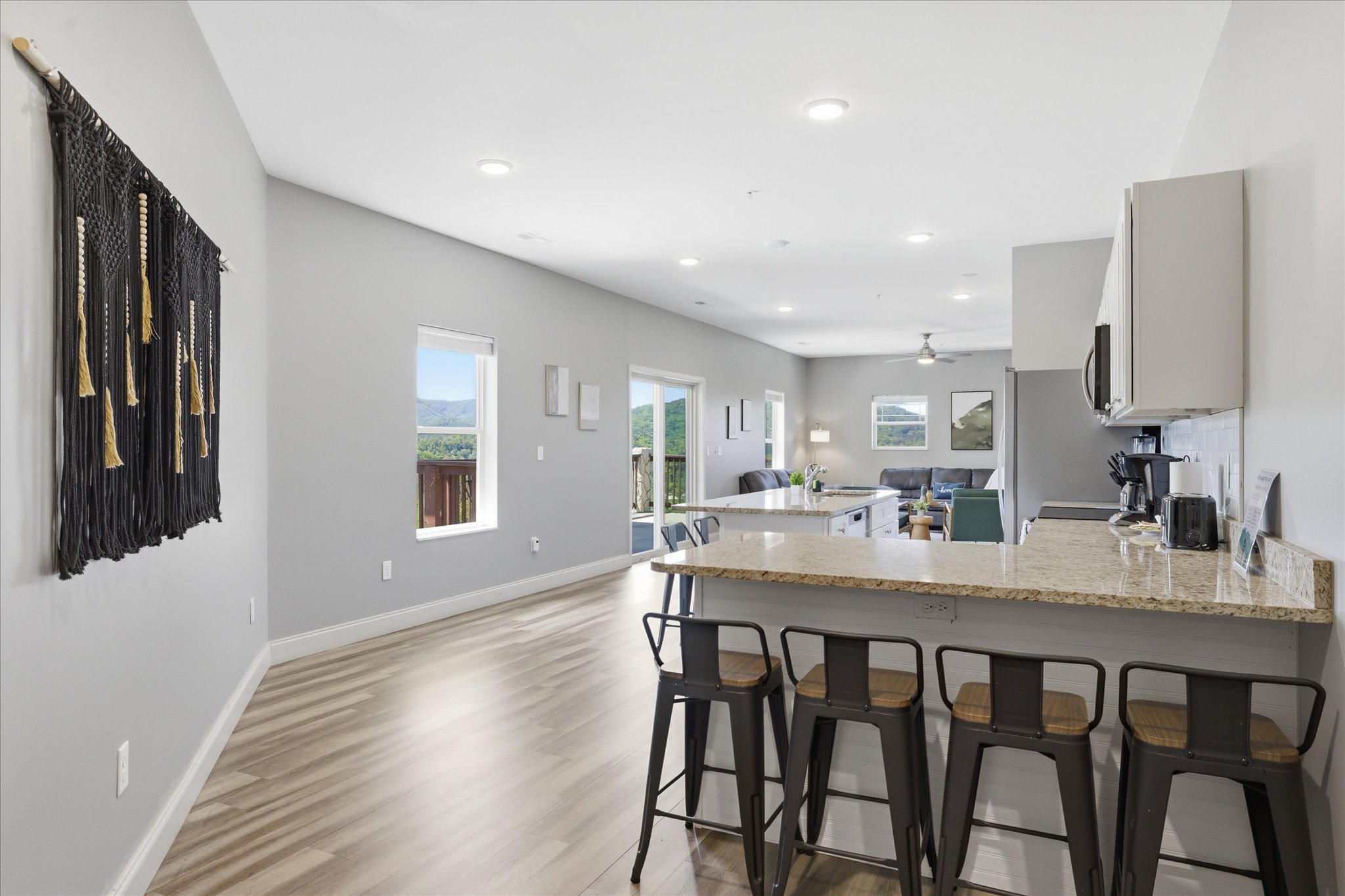 Don’t miss the second setup—another four seats means more room to gather, spread out, and stay connected. No one’s stuck on the sidelines in this kitchen.