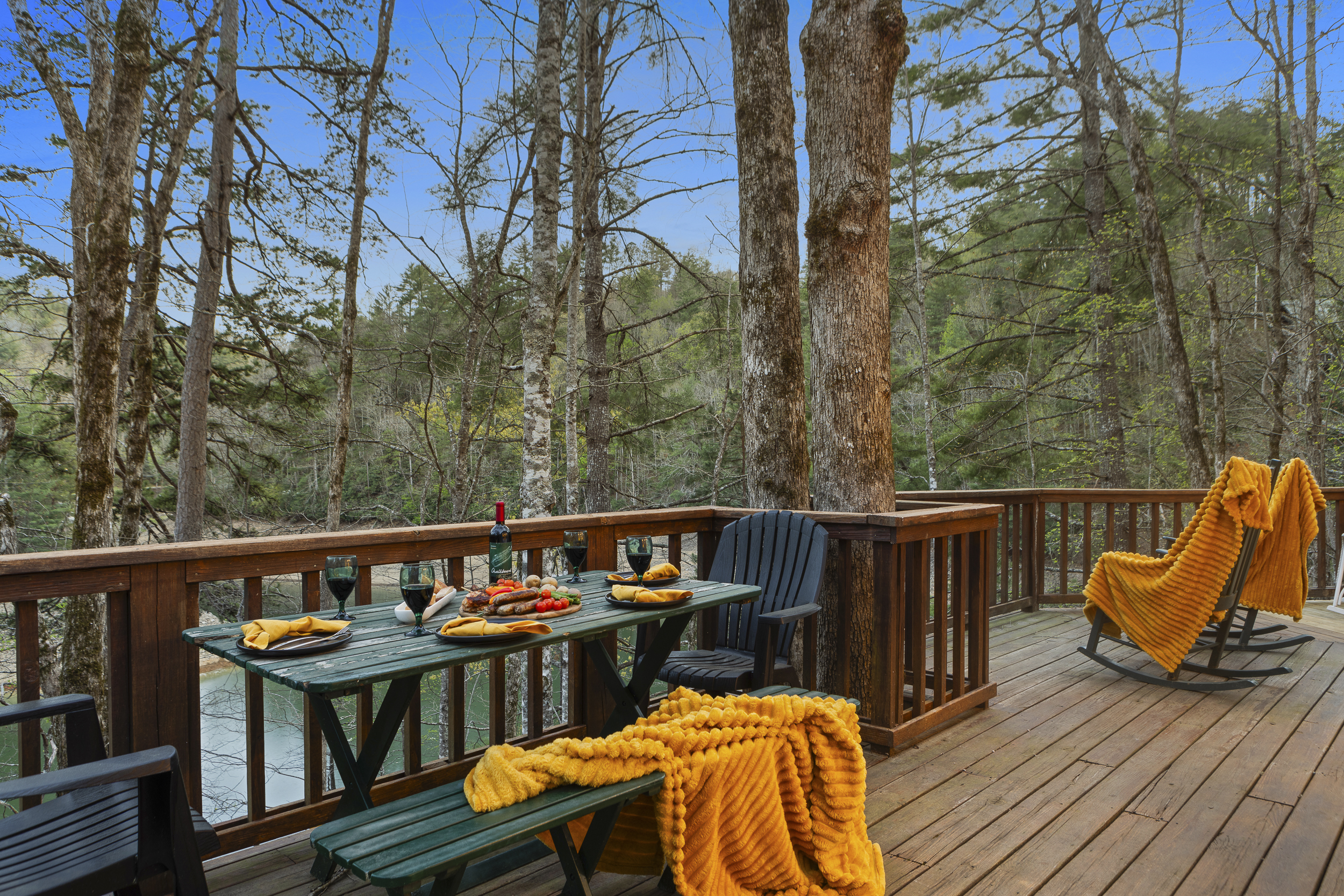 Outdoor Deck: Enjoy al fresco dining amidst nature with stunning forest views and gourmet treats!