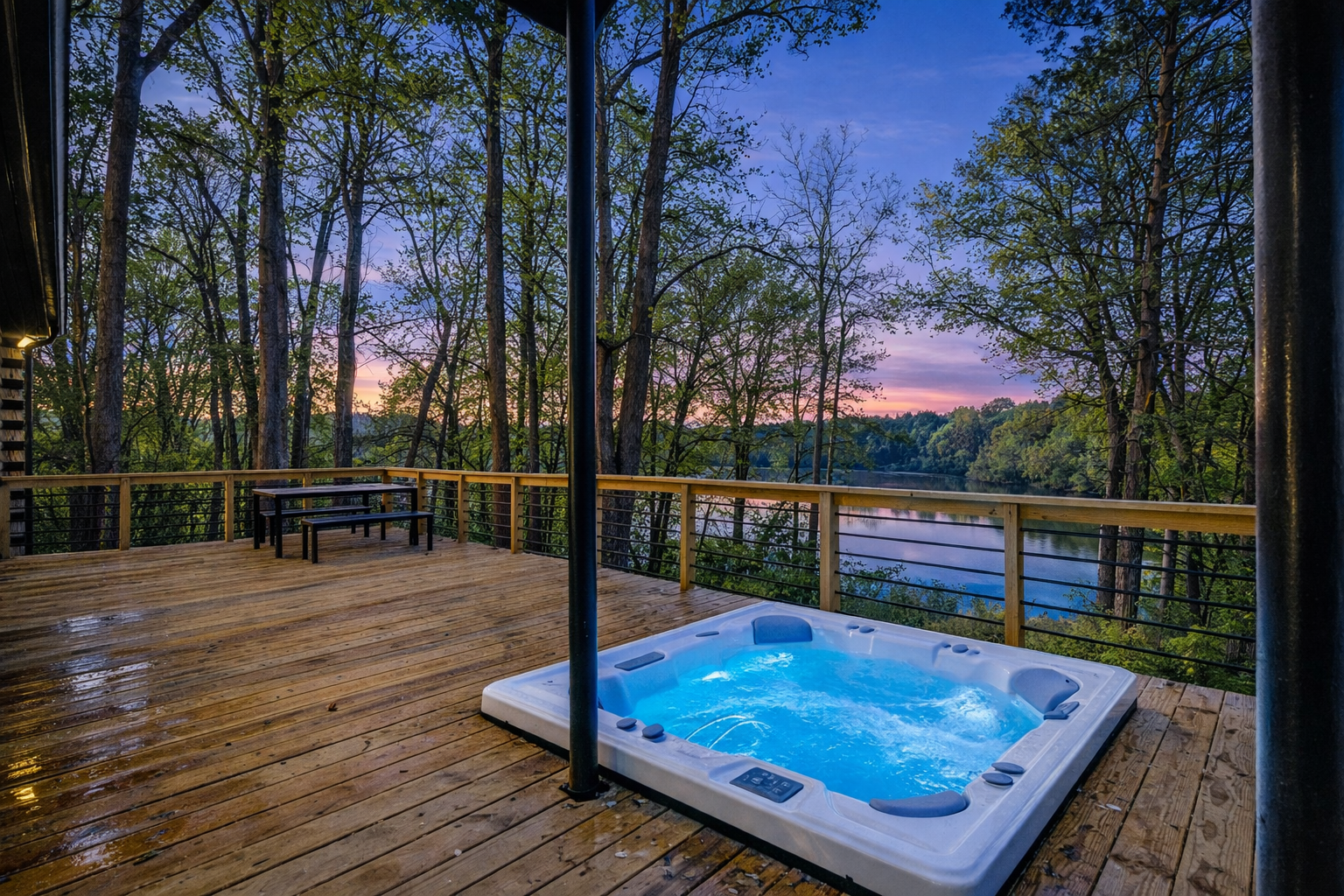 Outdoor Oasis: Unwind in the hot tub with stunning sunset views over the serene river!