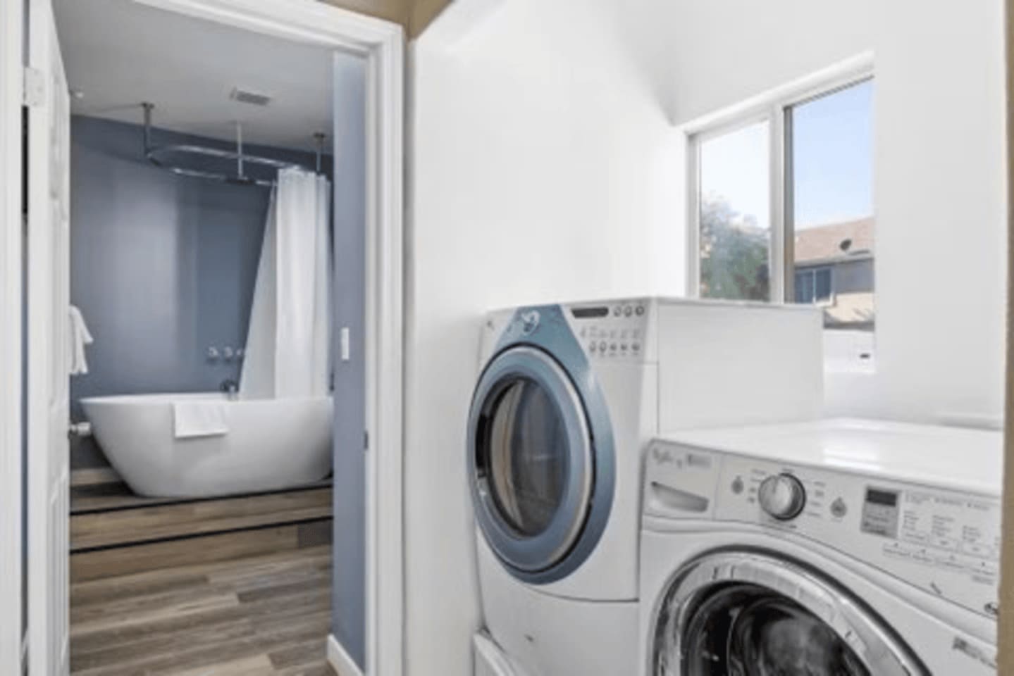 Dedicated laundry area with washer and dryer, ideal for long term stays, extended trips, or refreshing linens during your stay.