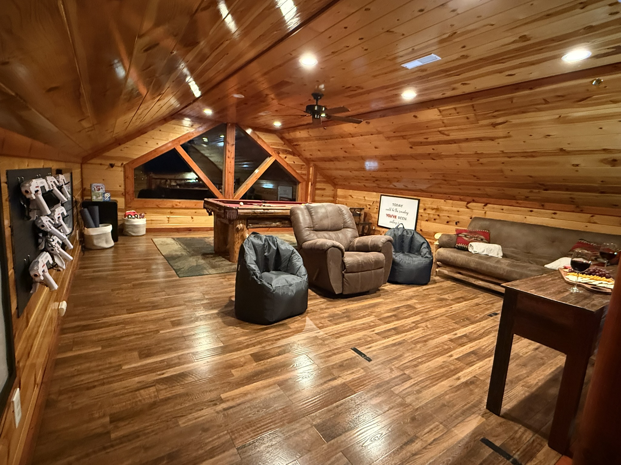 Our spacious entertainment loft designed for all ages—loaded with games, laser tag, cozy seating, and plenty of room to relax or compete.