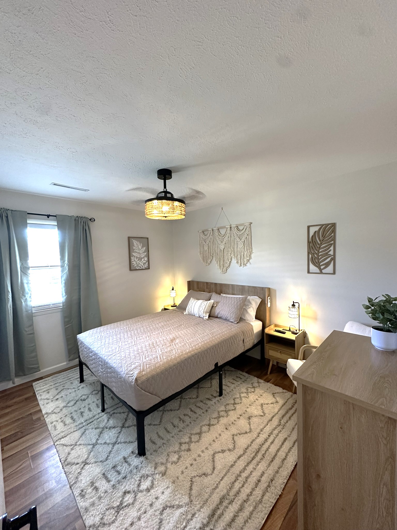 Queen bed, ceiling fan, closet and 43" smart TV