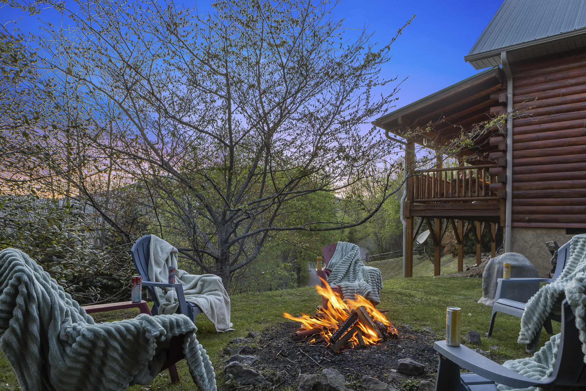 Fire Pit Retreat: Gather around the fire, sip drinks, and soak in breathtaking mountain views!