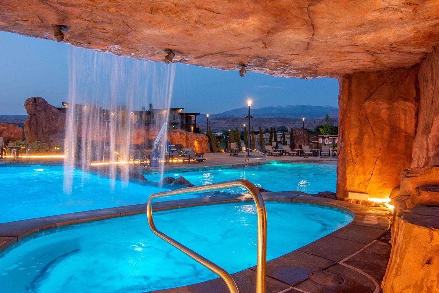 Grotto hot tub with waterfall