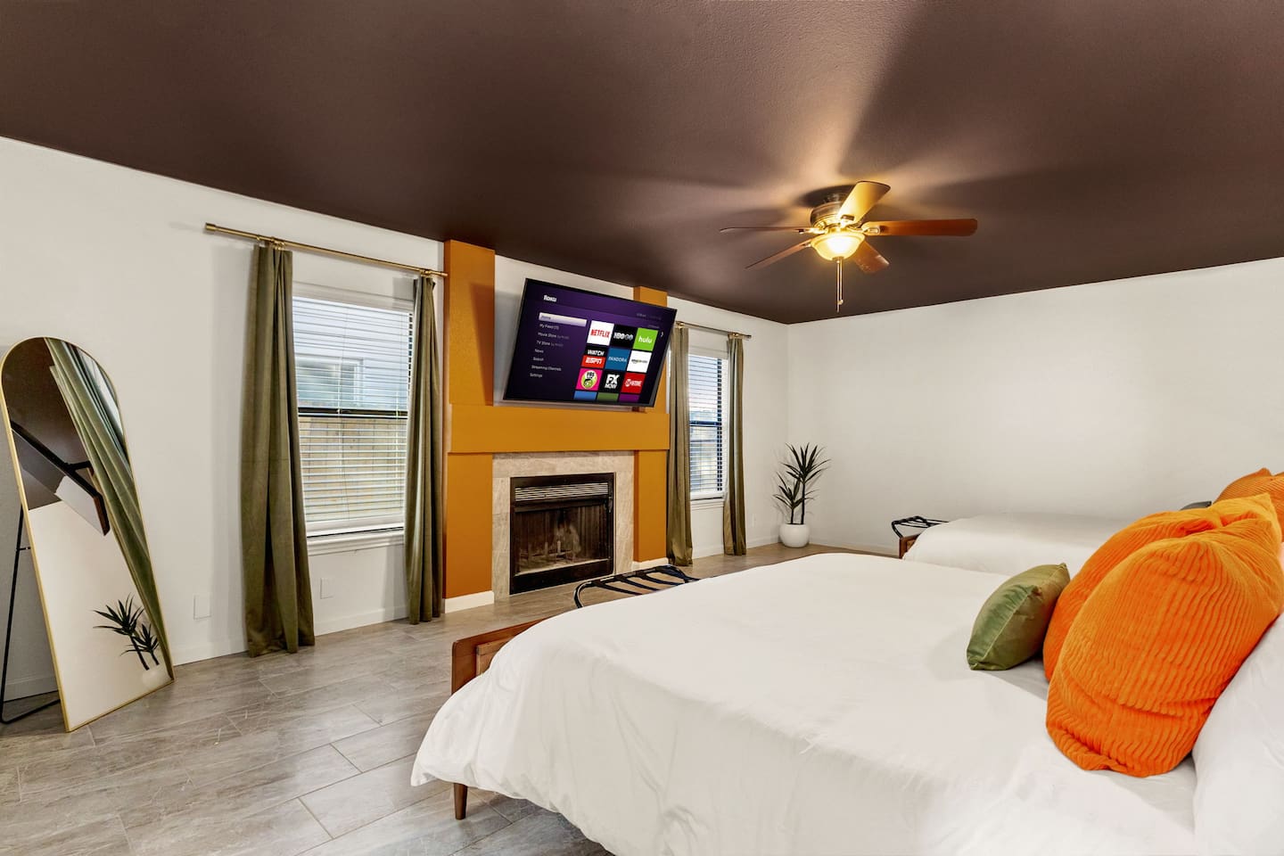 Stretch out and relax in this roomy, stylish bedroom—complete with 2  comfy King beds, a fireplace, and a large Smart TV for movie nights in. Ideal for families or groups who want space to chill after exploring San Antonio!