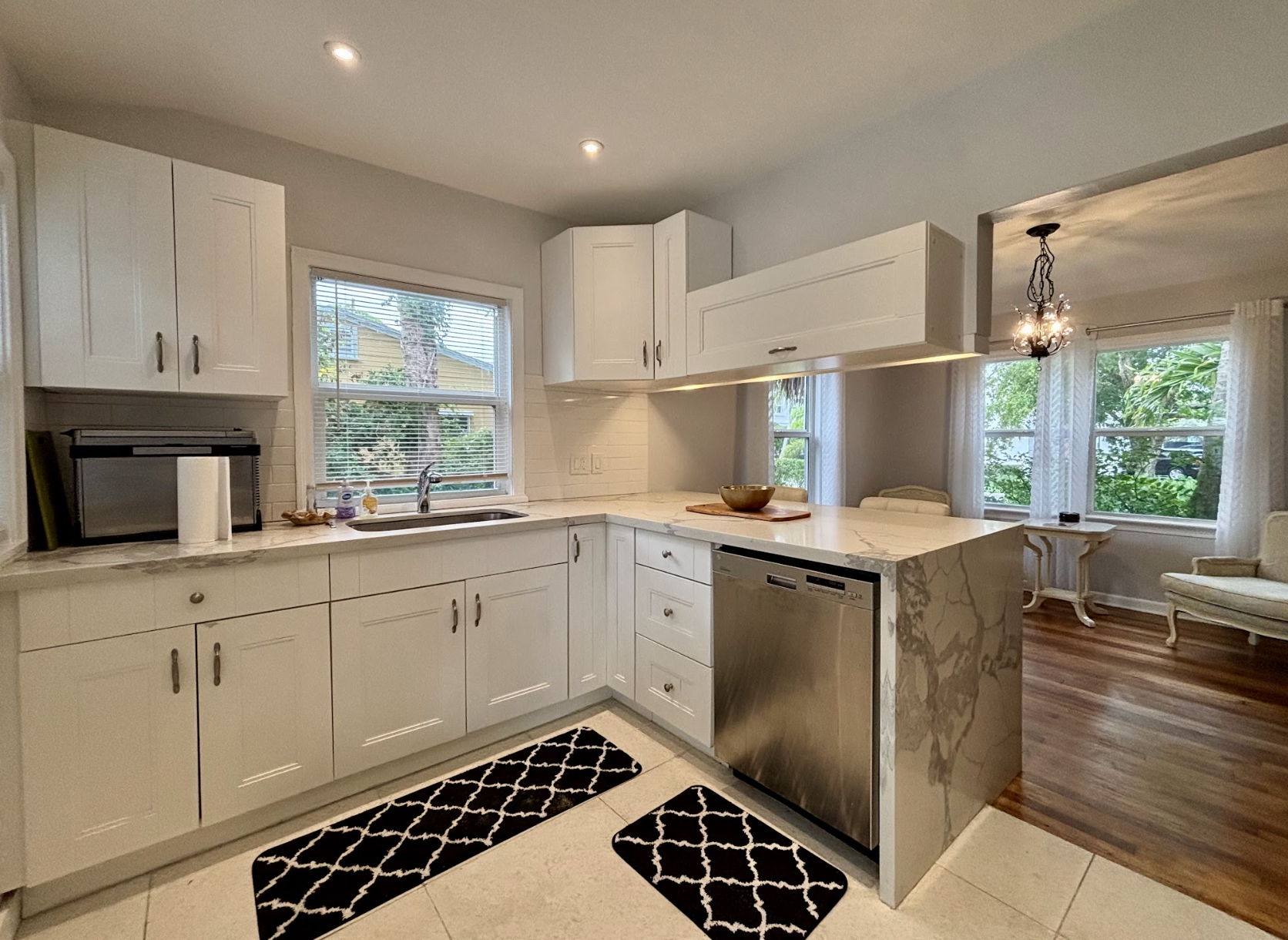 The modern, updated kitchen has all the essentials to make your meals for everyone to enjoy.