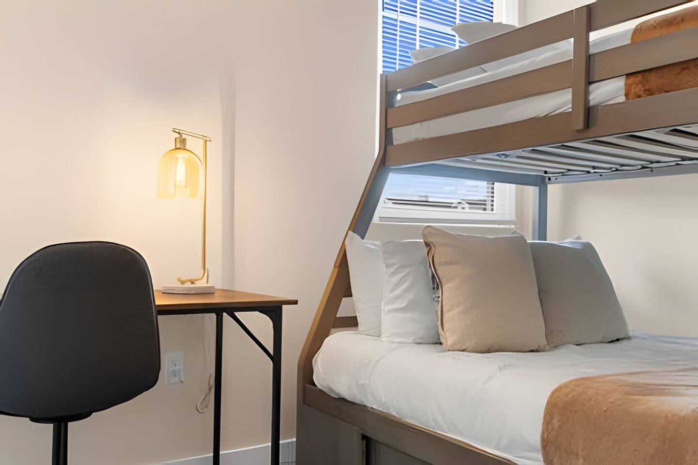Comfortable and stylish room with bunk beds, ideal for families or small groups.