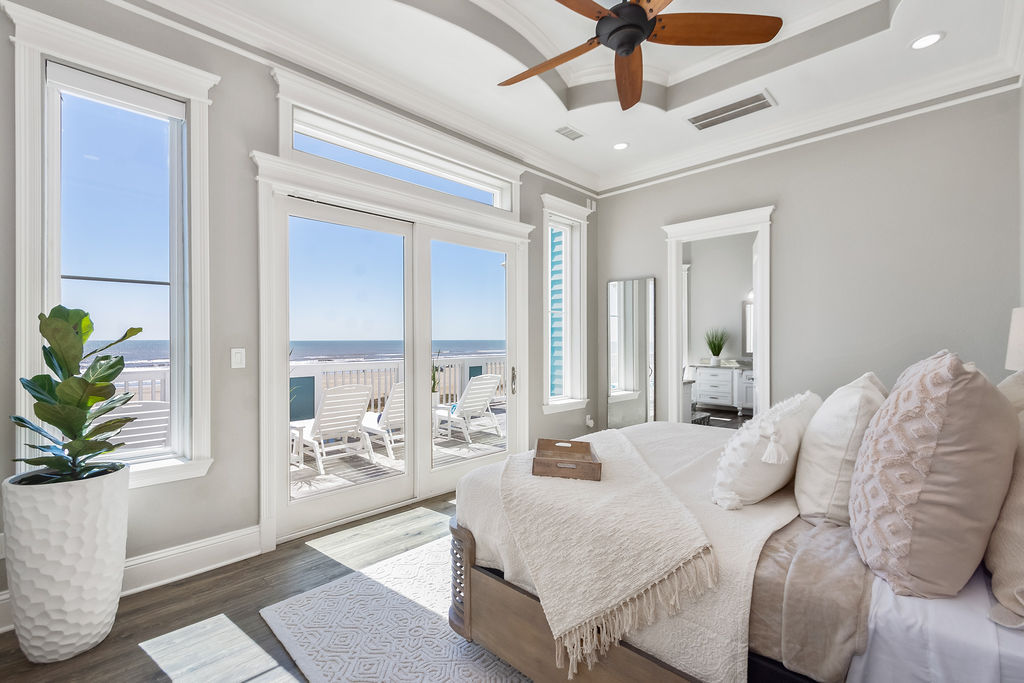 Grand Primary Suite with access to top floor balcony