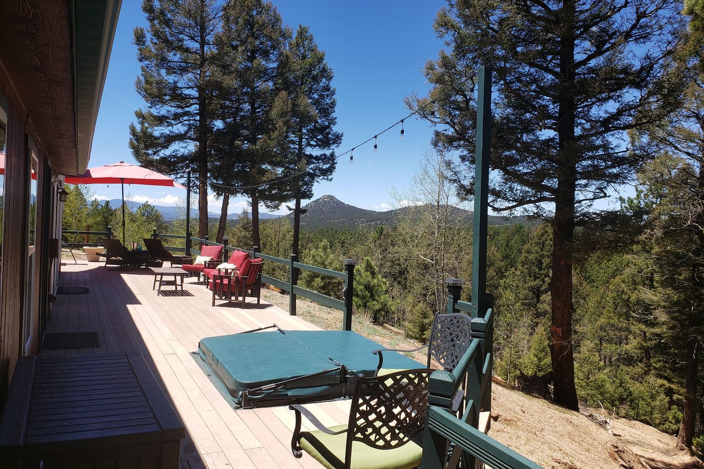 Wrap around deck with an in-ground spa