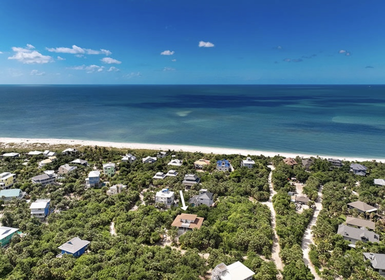 Beach access is effortless: just a quick one minute golf cart ride or a three minute scenic walk