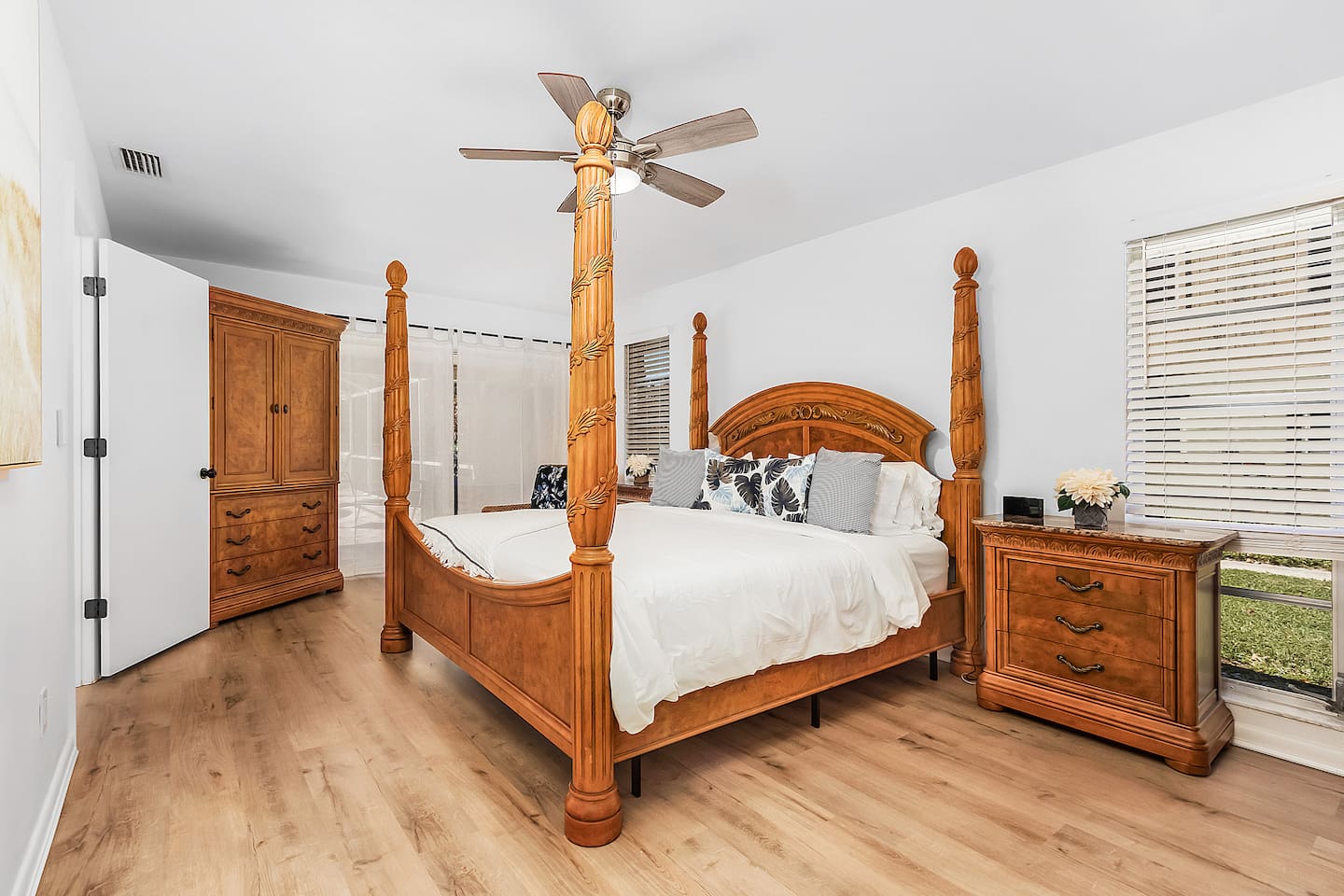 Relax in the primary bedroom (King-size), complete with a TV and direct access to the lanai and pool area for seamless indoor-outdoor living!