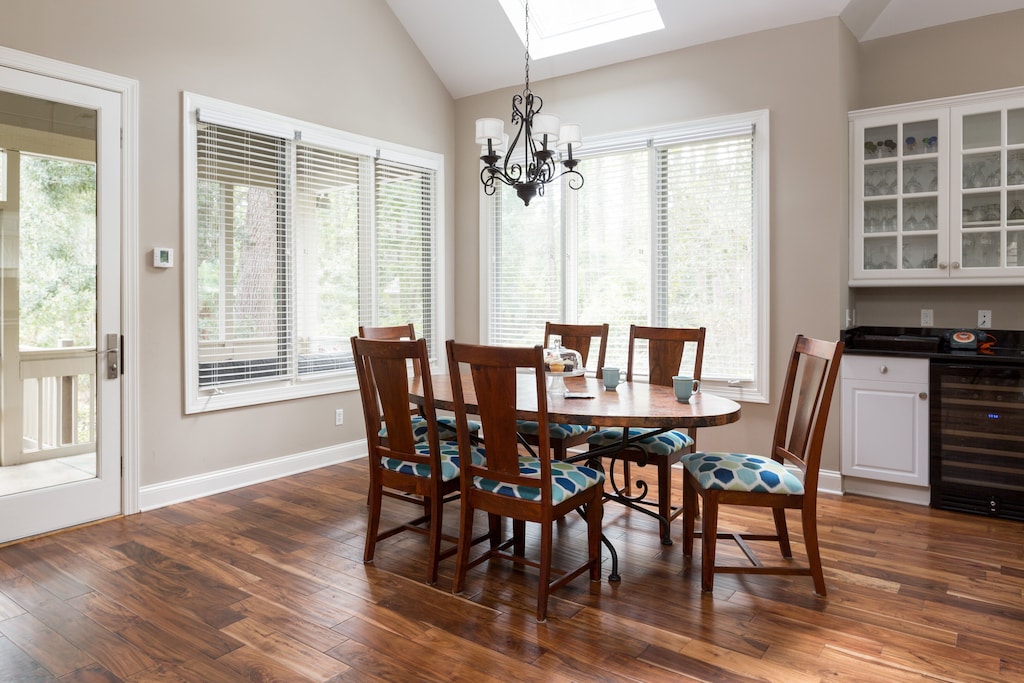 Kitchen dining area located between the screened in porch and kitchen