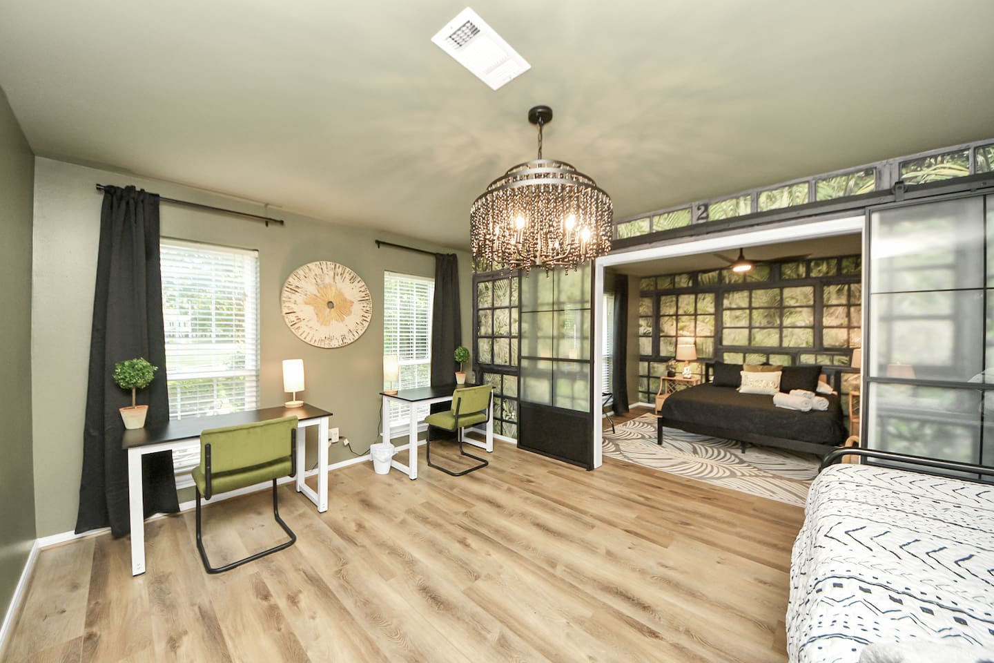 Guest suite complete with full size bed and two desks so you can get work done if you really need to!