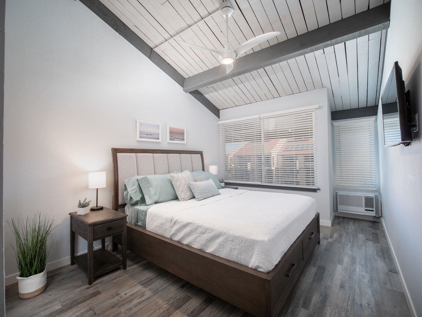 Master Bedroom Upstairs with AC in window. Cal-king Bed