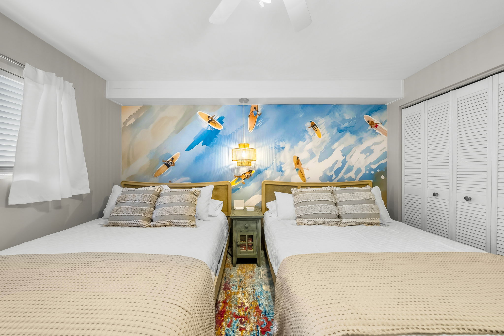 Surf's Up! themed guest bedroom (we've even got card games tucked into the bottom of the nightstand)!