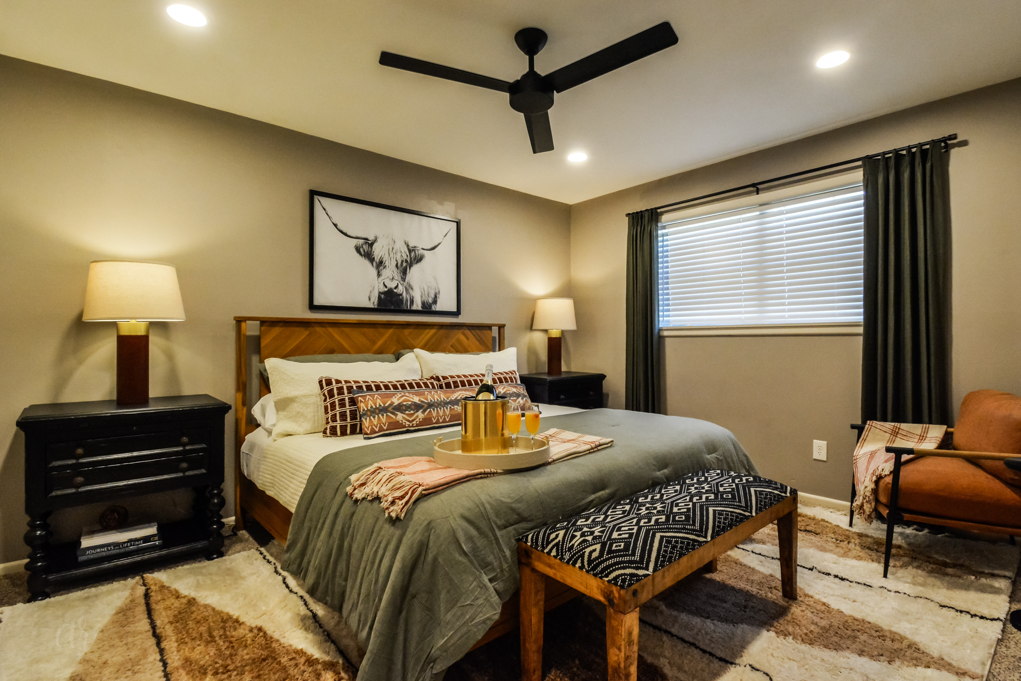 Rest Easy in Ranch Comfort → Features a cozy king bed, warm tones & modern western flair — unwind and recharge for another great Texas day.