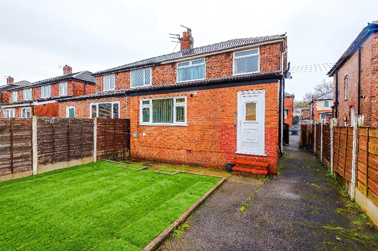 The rear garden benefits from great space and lawn area